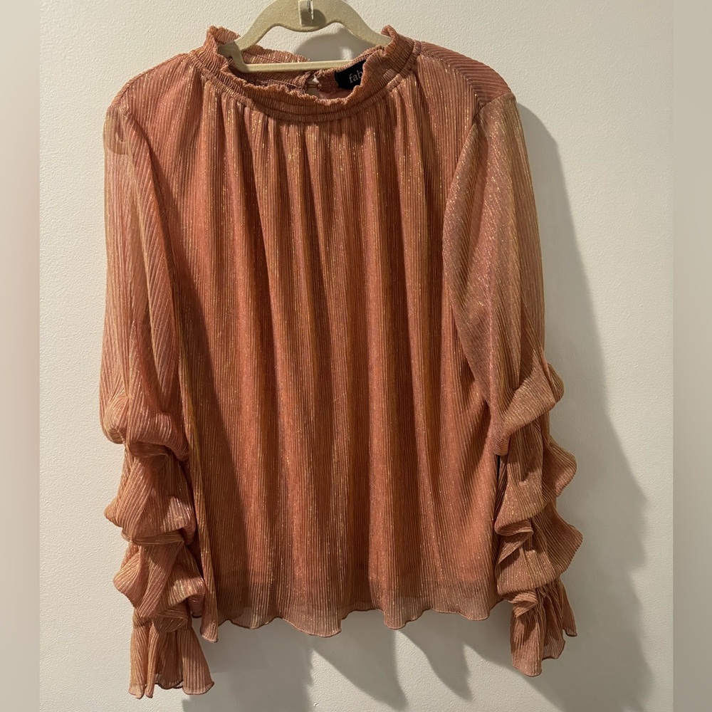 Brand new peachy sparkly blouse